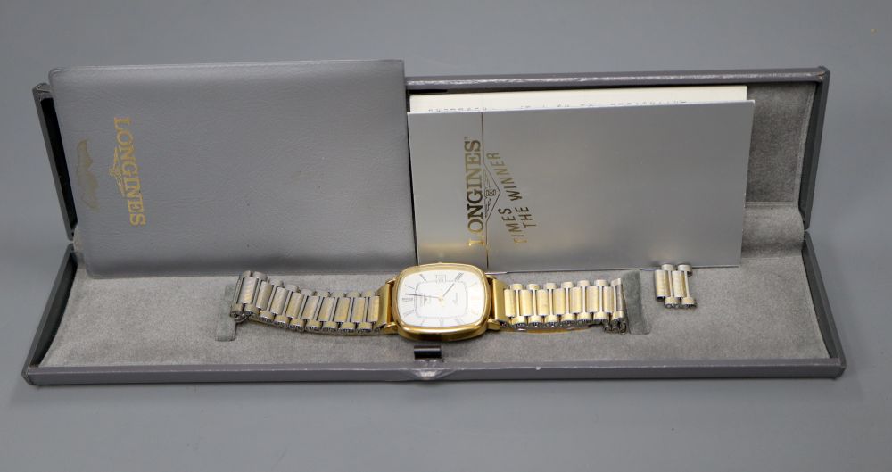 A gentlemans modern steel and gold plated Longines Presence quartz wrist watch, on associated bracelet, with box and cert,